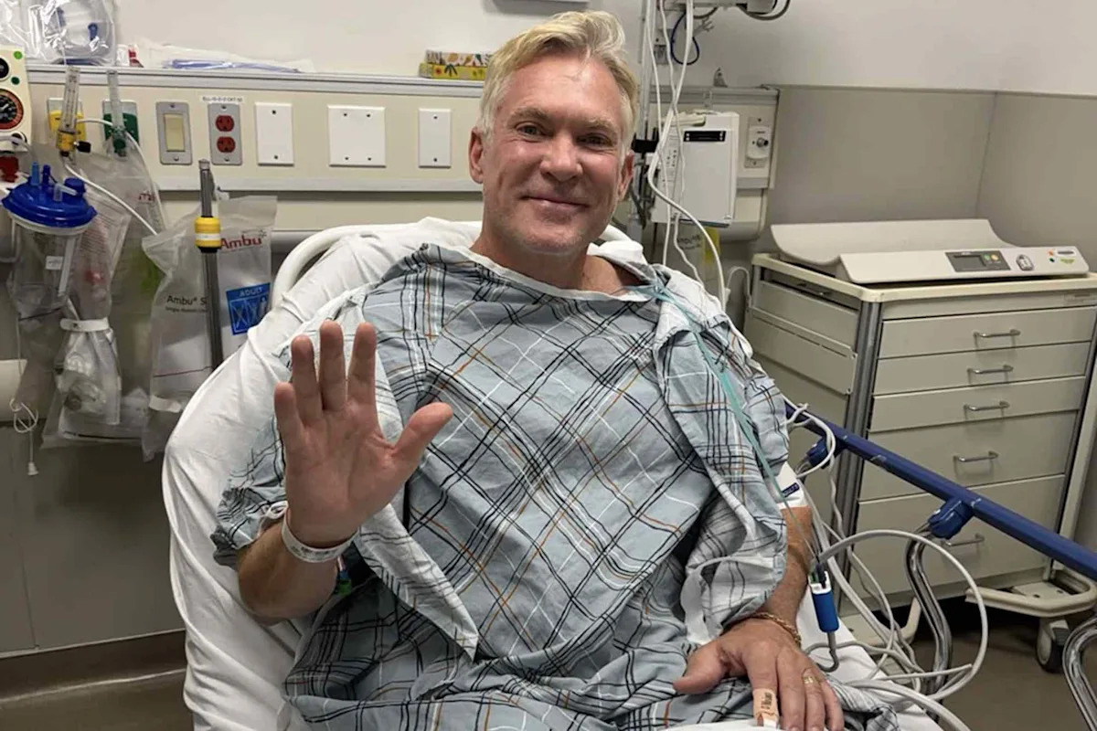 “Good Morning America”’s Sam Champion Gives Update from His Hospital Bed After Undergoing Procedures at Heart Hospital
