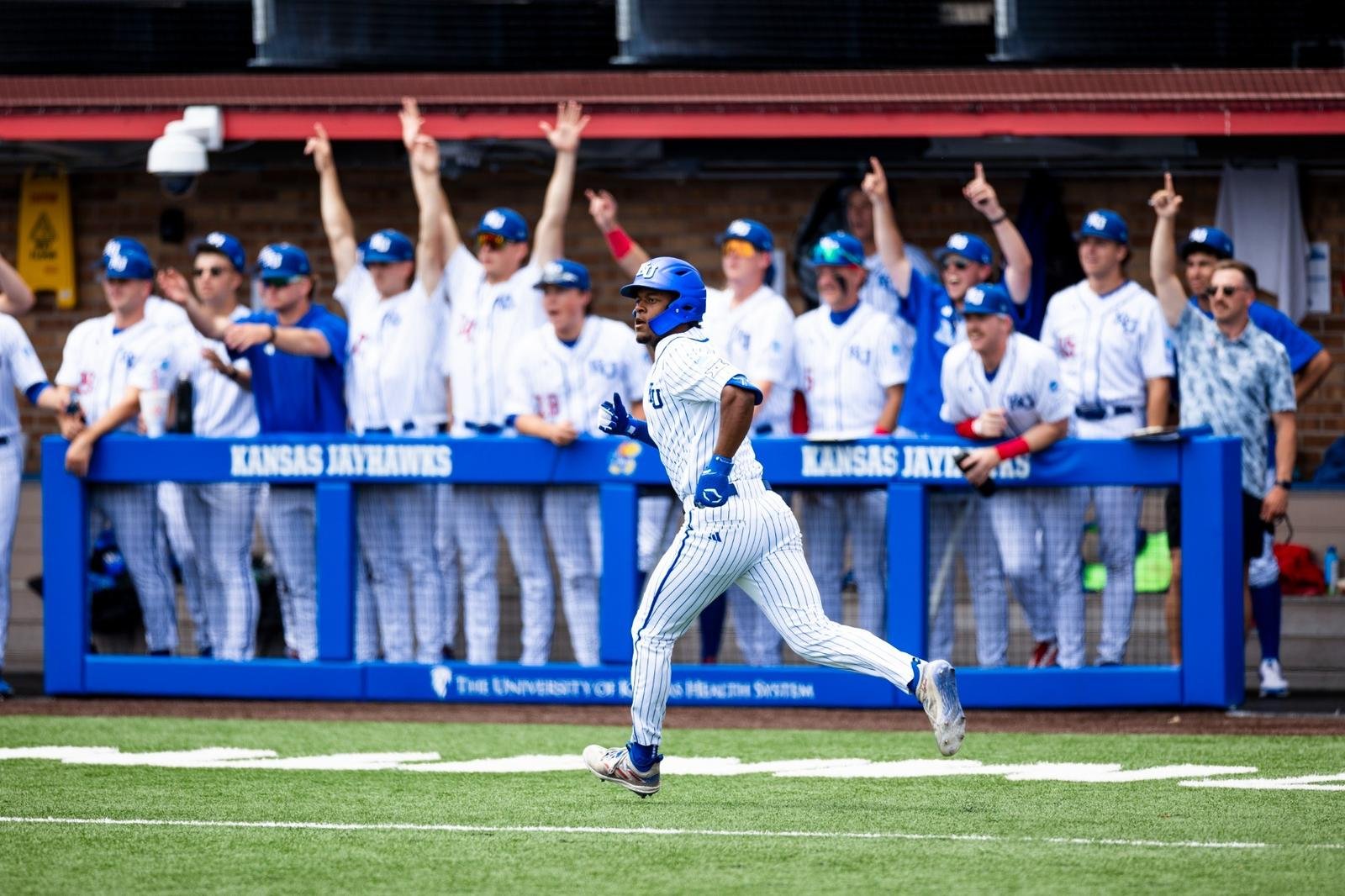Kansas Wins First Game of Lawrence Regional; Breaks Multiple Program Records