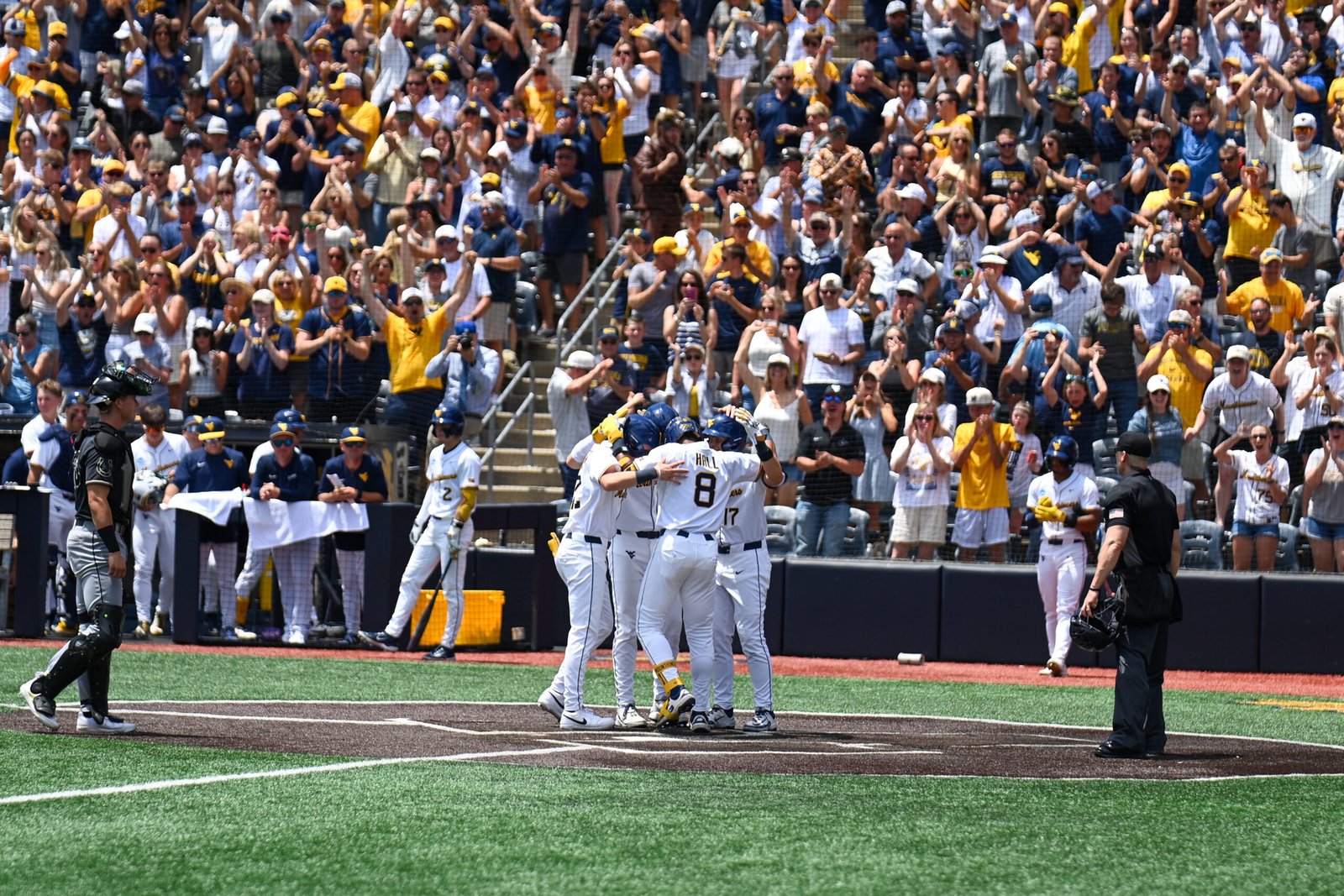 Super strong impression: Mountaineers roll to 12-2 win against Cal Poly in series opener
