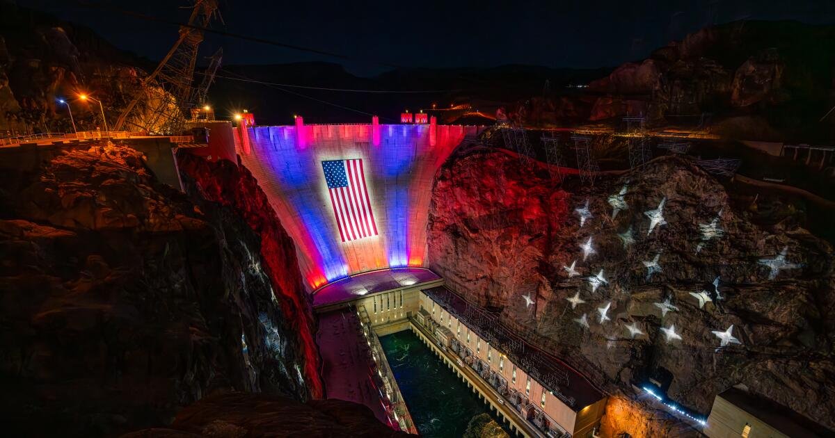 Hoover Dam, challenged by drought, now wears a massive U.S. flag