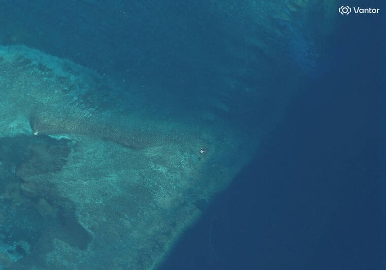 Satellite images reveal mystery structure at disputed Scarborough Shoal
